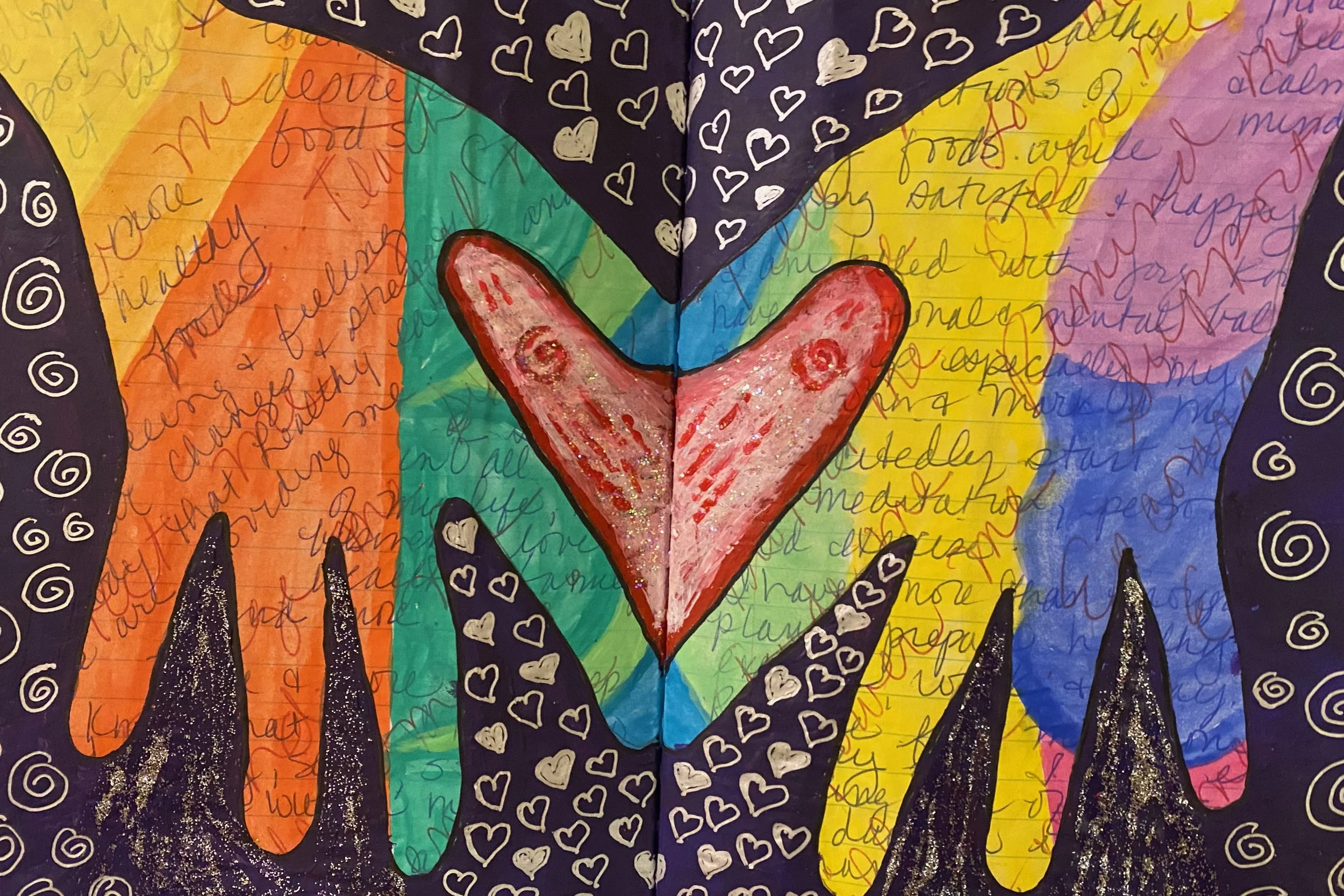 Colorful artwork featuring a red, pink, and white heart with glitter, set against a rainbow background with handwritten notes and black sections decorated with white and silver hearts and swirls.