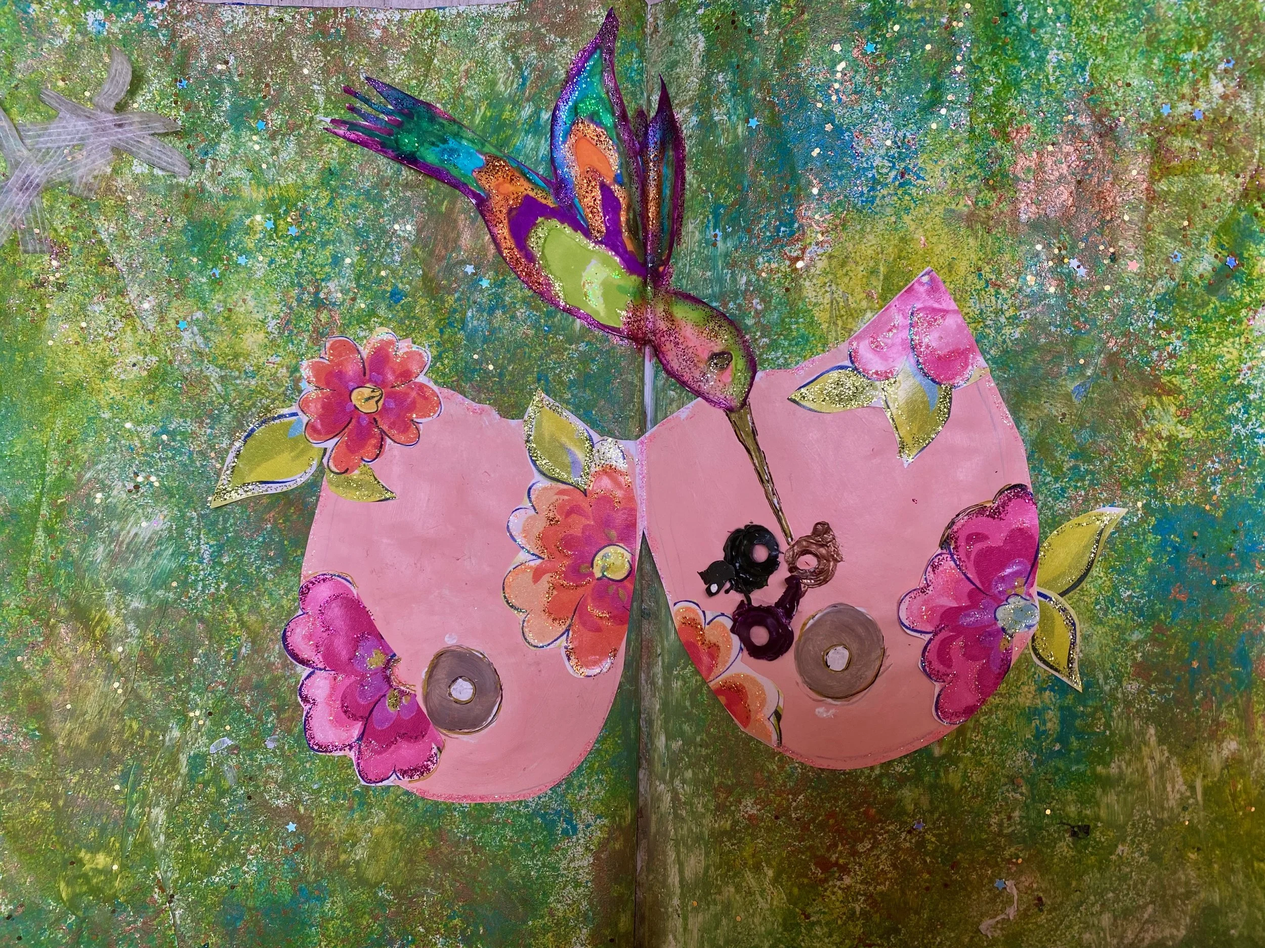 Colorful mixed media artwork featuring a butterfly with multicolored wings, pink floral embellishments, a green background with splashes of various colors, and a star-themed overlay.
