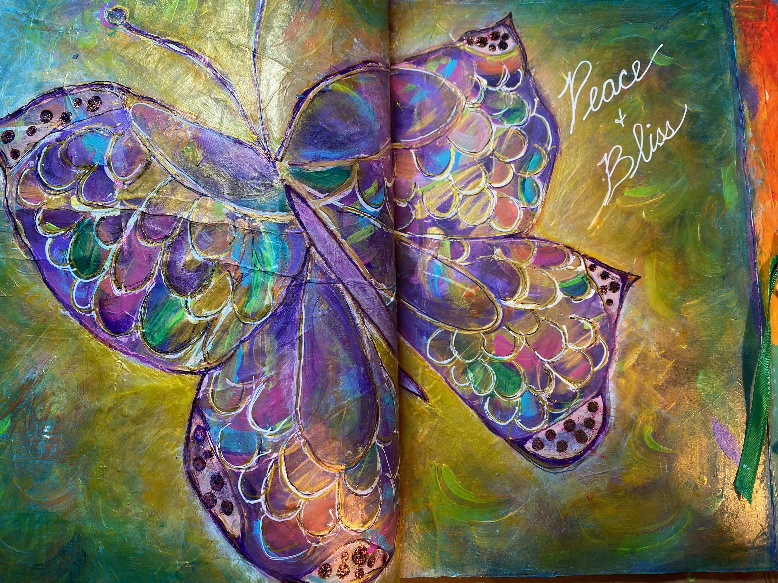 A colorful, artistic painting of a butterfly with purple, blue, and green wings on a yellowish-green background. The words 'peace & bliss' are written in white cursive on the right side.