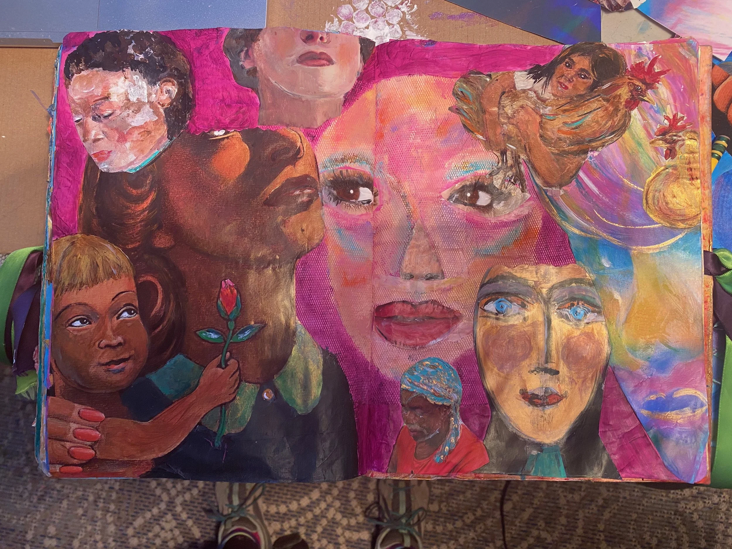 A colorful mixed media artwork featuring multiple faces of women with various skin tones and hairstyles, with some faces having painted eyes and others having realistic eyes. The background includes vibrant pinks, purples, and other abstract colors, 