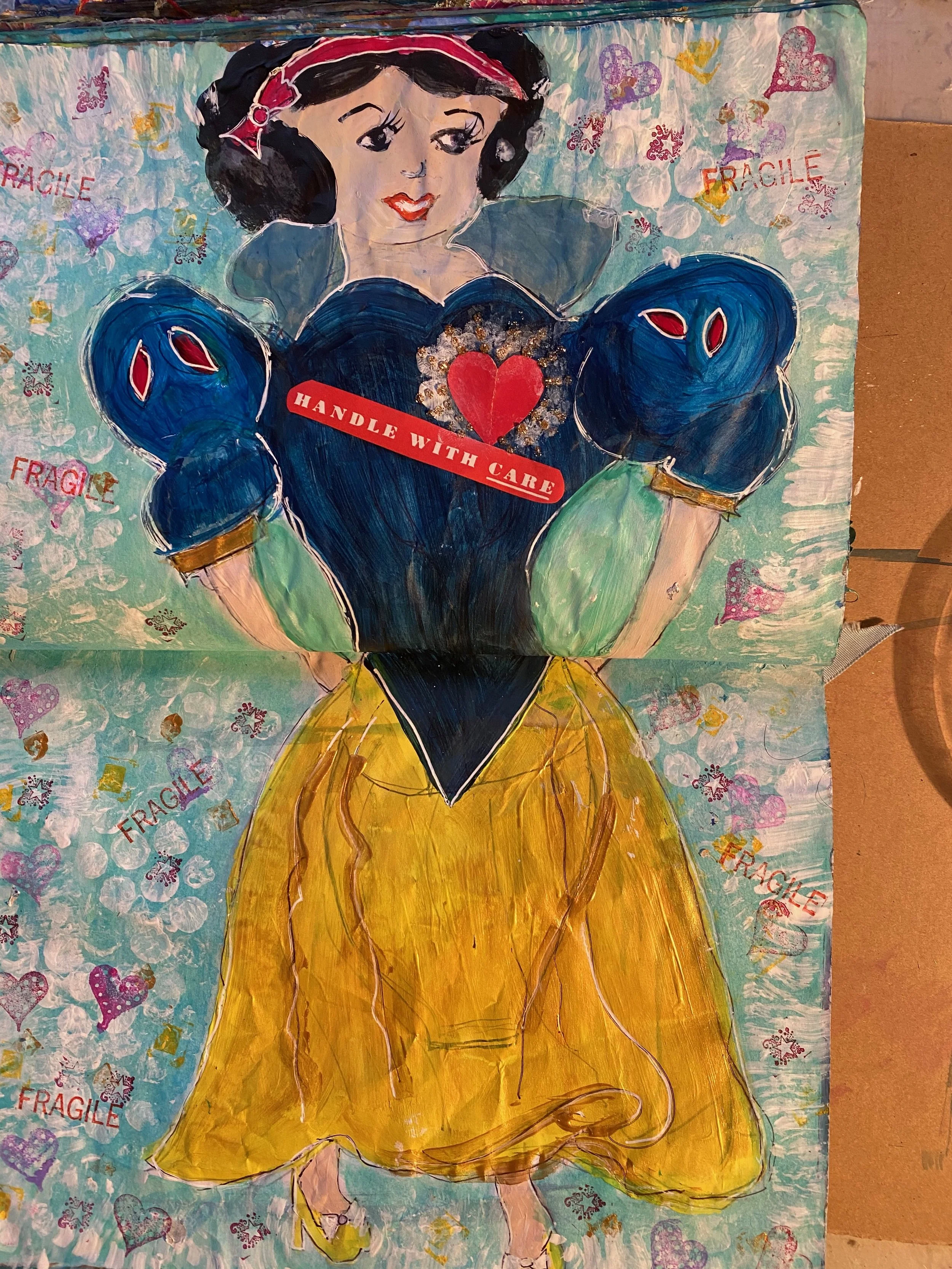 A colorful drawing of Snow White, with a red bow in her black hair, wearing a yellow skirt and a blue bodice, holding a heart-shaped object with the words "Handle with Care" written on it. The background is decorated with pastel-colored hearts and th