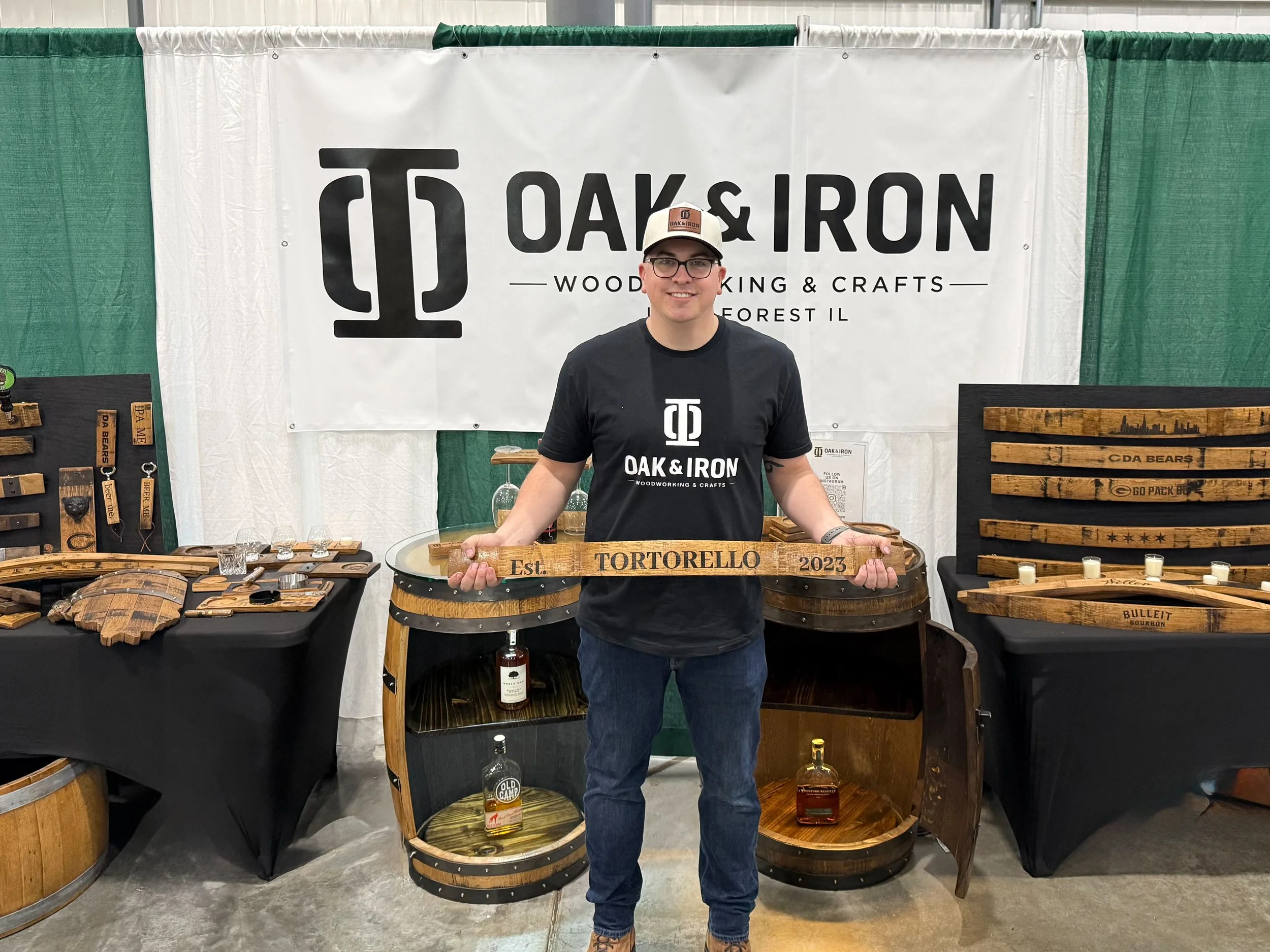 Owner Parker holding product at first event booth.