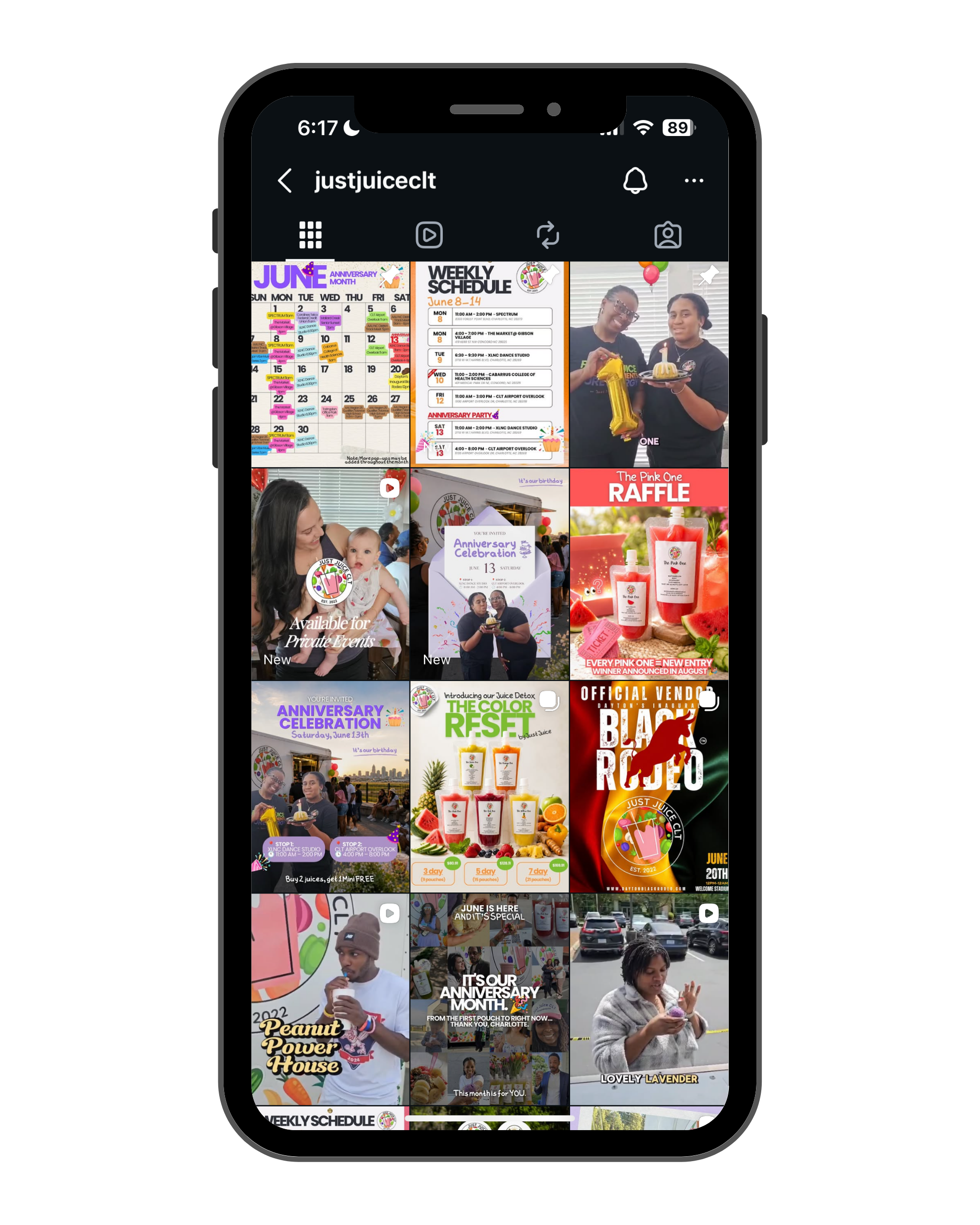 A smartphone displaying the Just Juice CLT social media profile featuring event announcements, cold-pressed juices, smoothies, wellness content, and promotional posts.