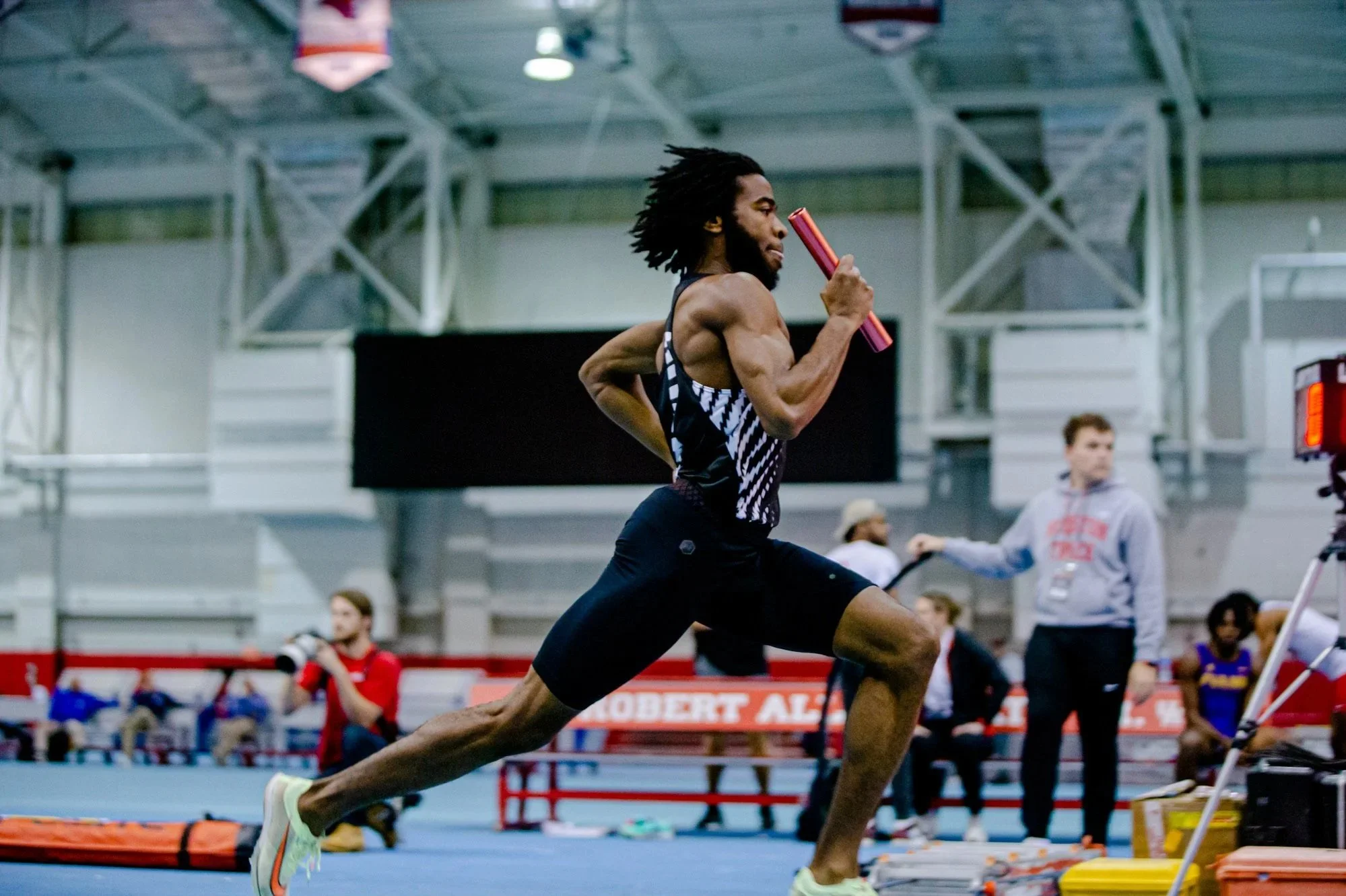 Travis Jacobs sprinting down the home stretch at University of Houston where he brought the Houston Christian University Huskies to their fastest Distance Medley Relay in school history!