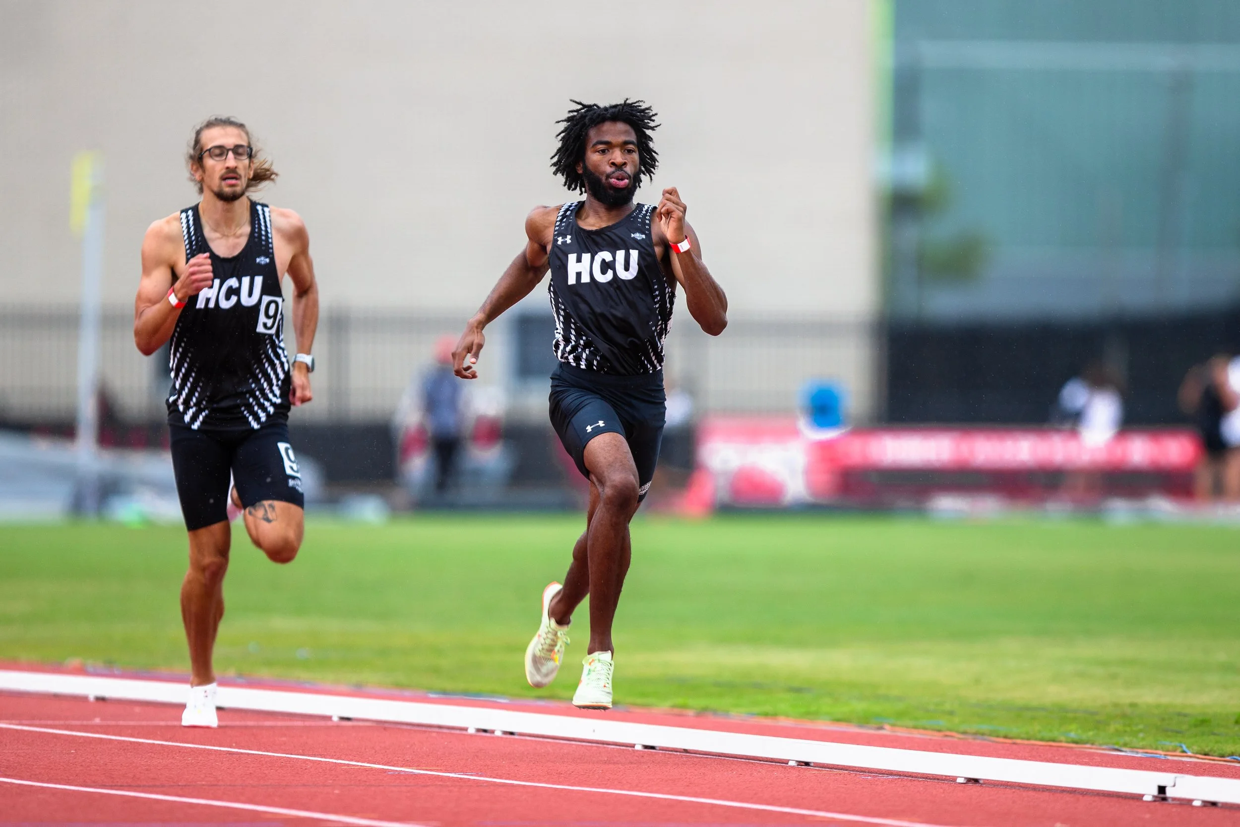 Travis Jacobs sprinting his way to the finish line of an 800 meter race. Travis goes on to win the 800 meter race at University of Houston!