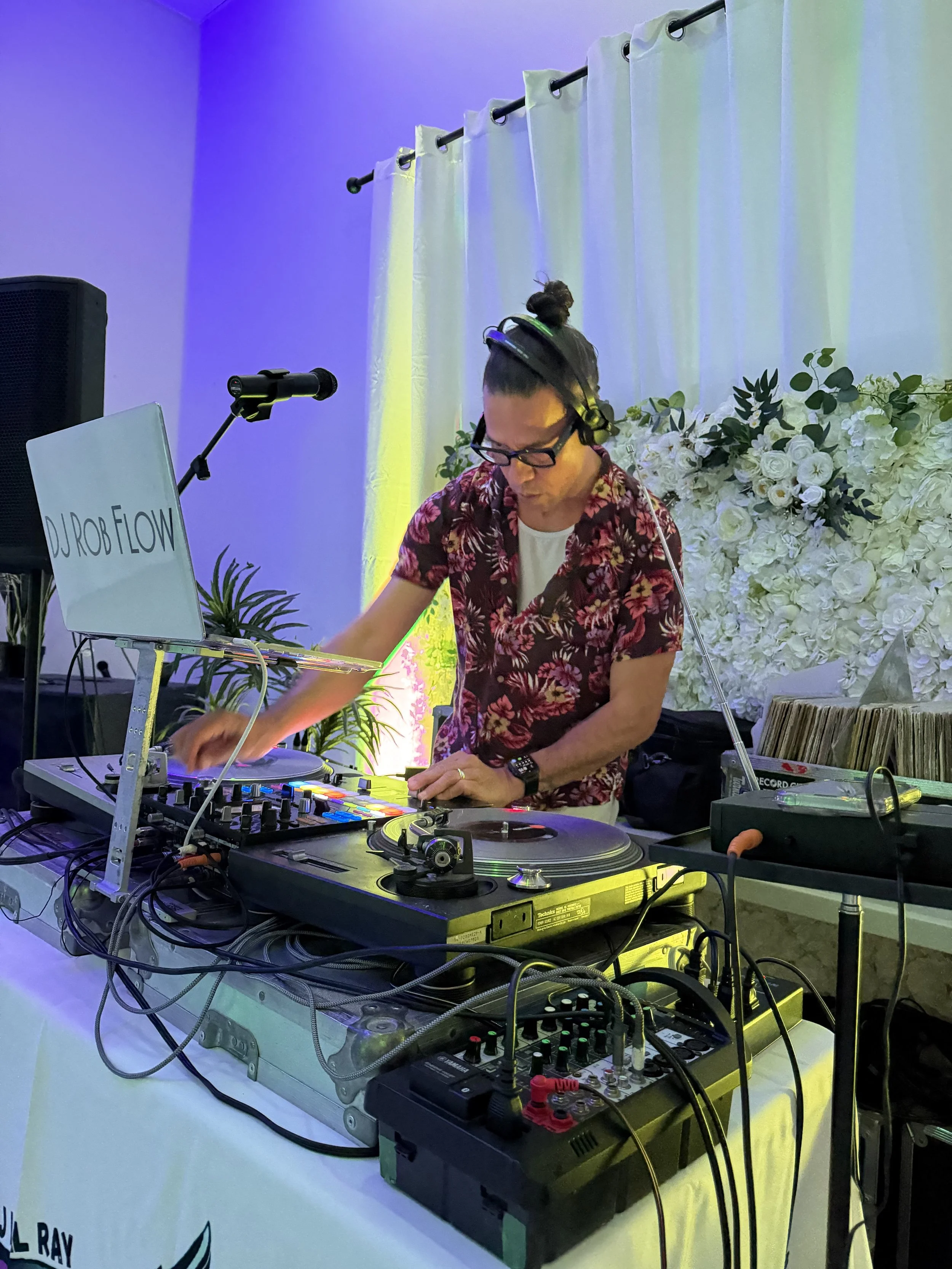 DJ Rob Flow spinning vinyl at a private party.