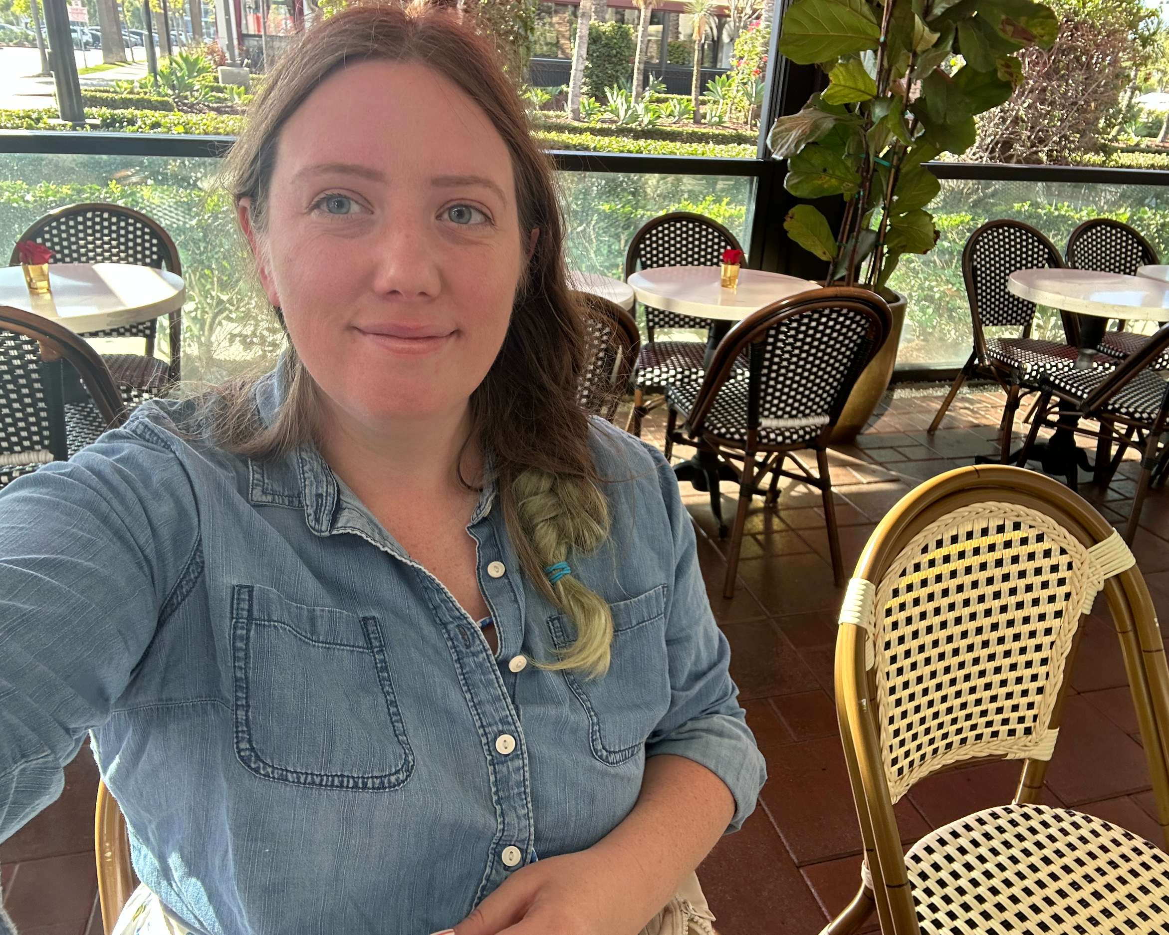 Photo of Briana in a Cafe in california smiling