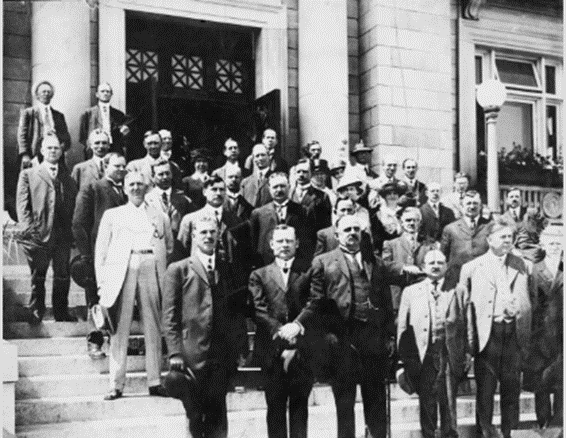Members of town planning commission, Calgary, Alberta. Gale can be seen in 3rd row, centre, identifiable by her hat. CA 1915-16. Glenbow Archives.