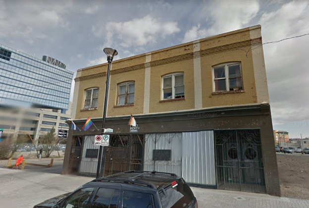 The Max Block – former location of the Calgary Eagle Bar at 424 8 AV SE. The building was constructed in 1912 by Max Cohn, one of many Russian-Jewish immigrants who moved into the East Village neighbourhood at this time. Both he and the buildings’ tenants are associated with the neighbourhood's early twentieth-century ethnic population. Note the Pride flags over the front door. From Google Street View, 2007.