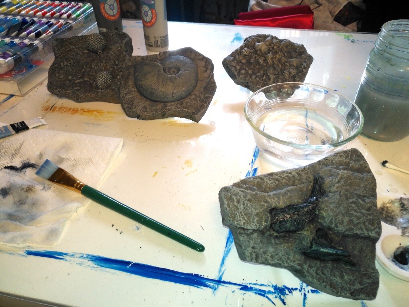 Devil in the details… Touching up some fossil replicas from the Glenbow that were a part of the exhibit.