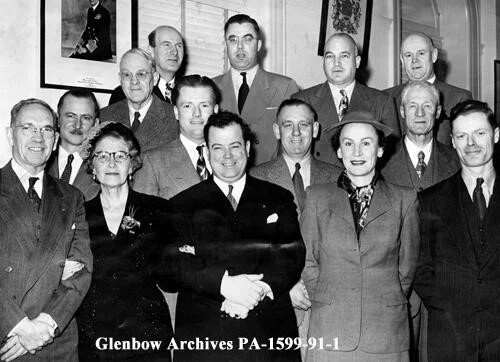 Aldermen Rose Wilkinson (front row, left) and Mary Dover (front row, right). 1952. "Calgary City Council, Calgary, Alberta.",&nbsp; (CU1201011) by . Courtesy of Libraries and Cultural Resources Digital Collections, University of Calgary.
