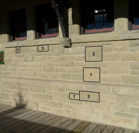 Different types of sandstone in the Claresholm railway station. Photo from Crocq (2010).