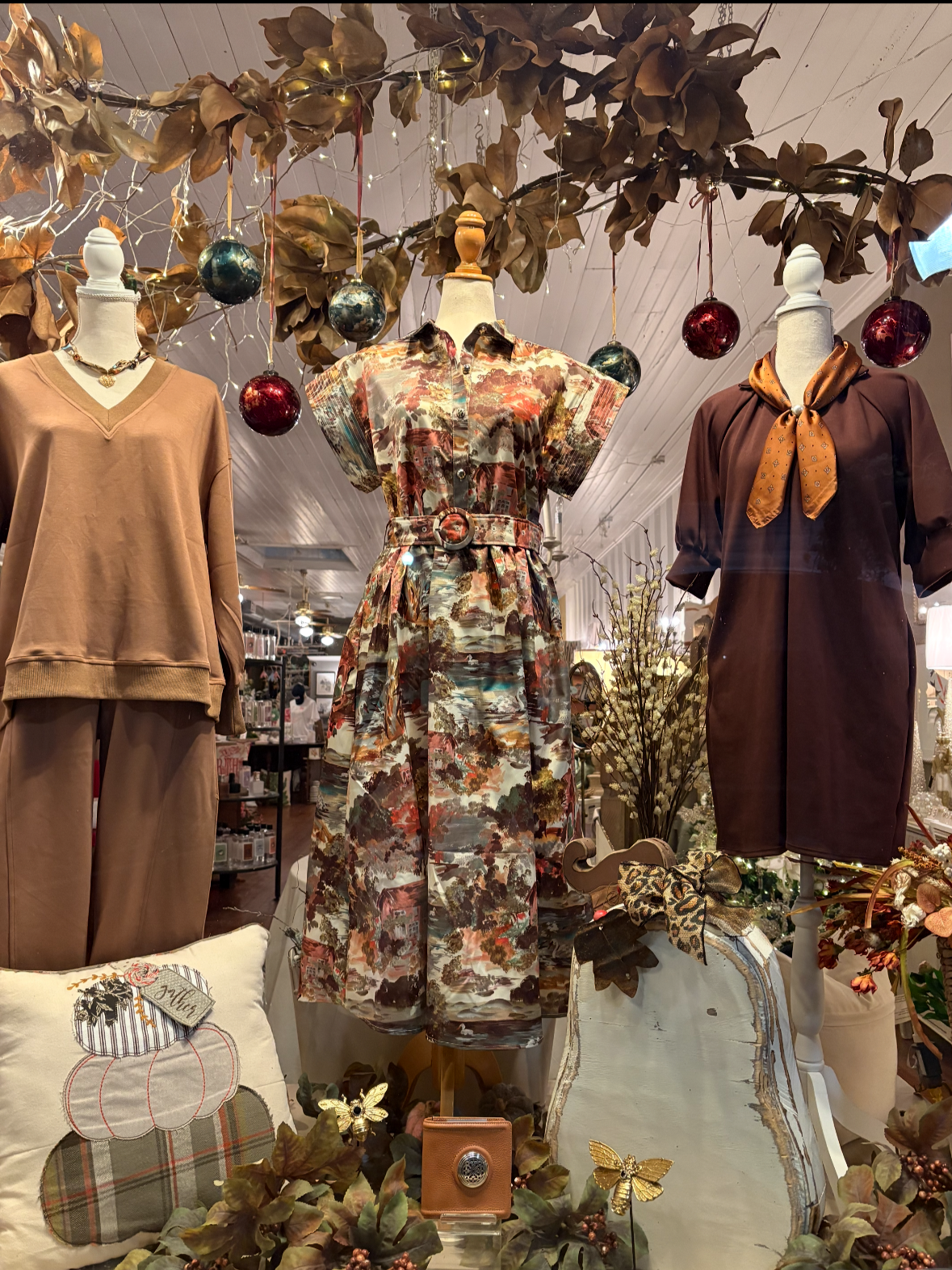 Curated collection of seasonal apparel, jewelry and home decor displayed at Wild Blossoms Boutique in Acworth, GA.