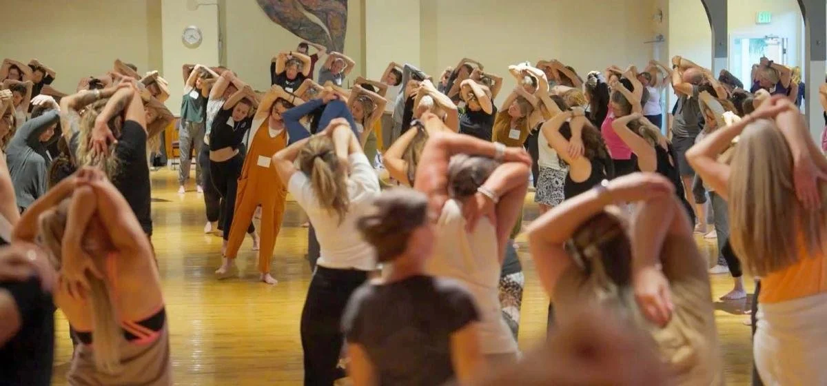 A group of women practice Fascial Maneuvers.