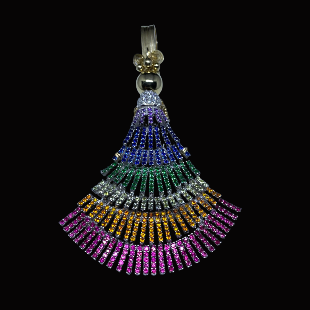 Colorful, jeweled pendant with a rainbow pattern and intricate design on a black background.
