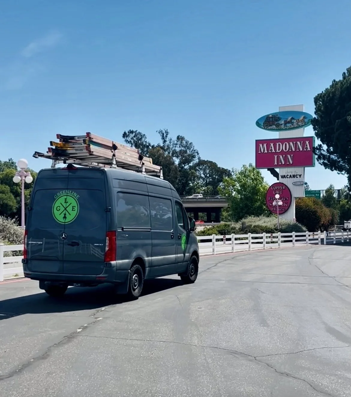 A GreenLine van driving at Madonna Inn in San Luis Obispo, California.