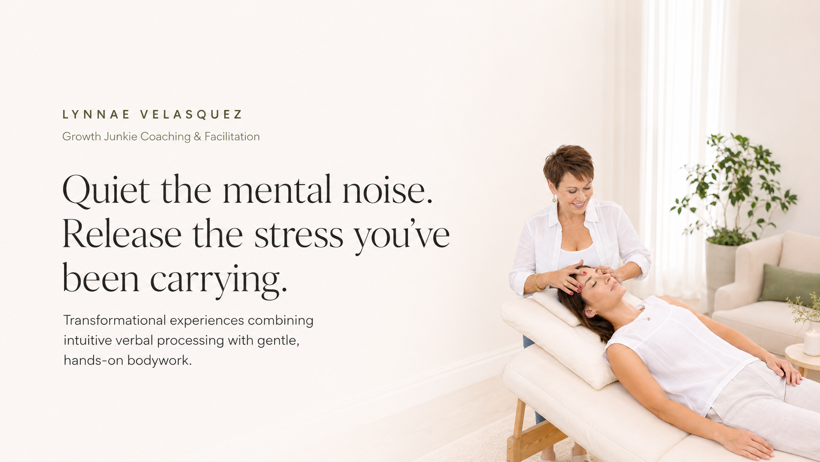 A woman receiving a head massage from a therapist in a calm and cozy therapy room with neutral decor and green plants.