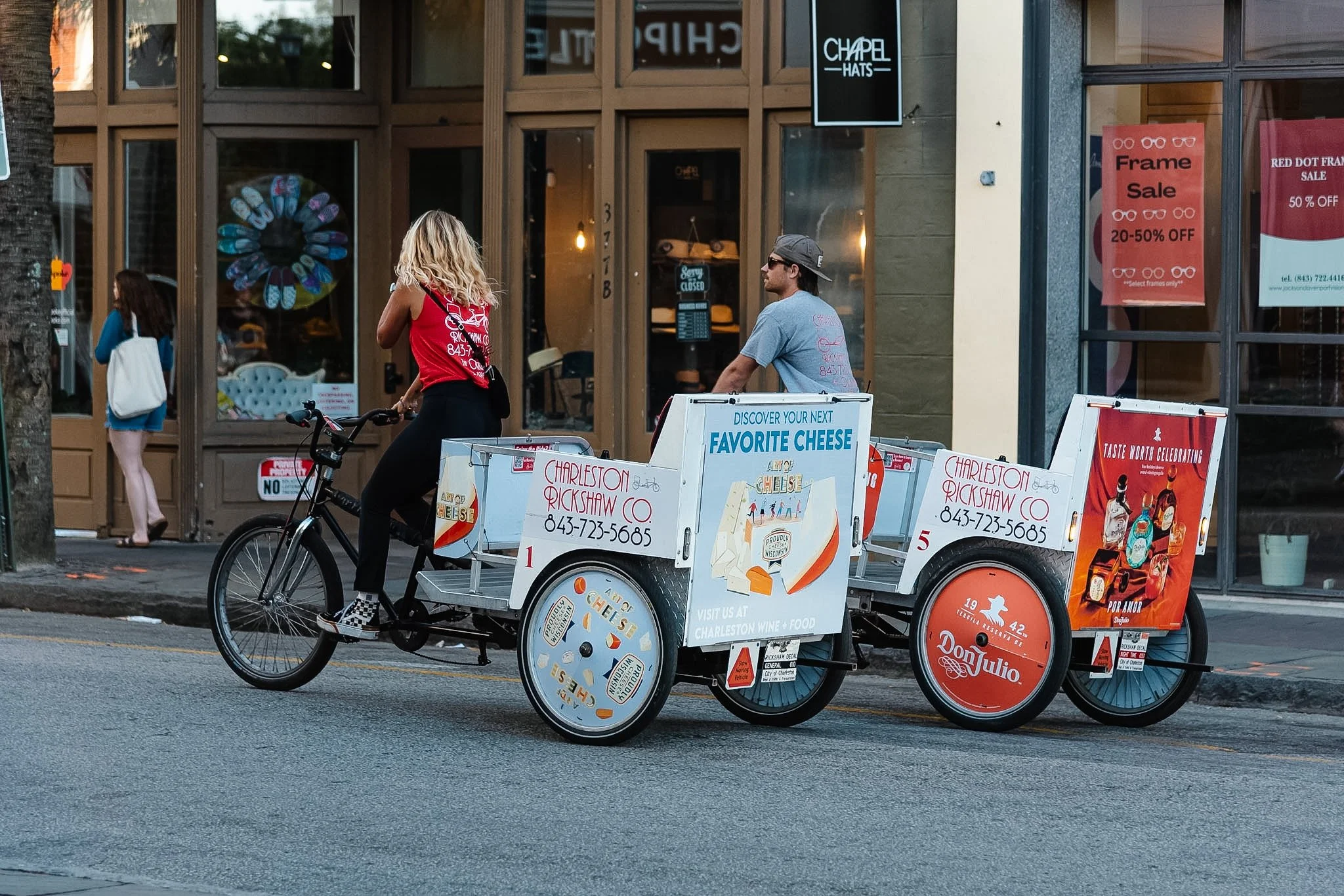 Charleston Rickshaw advertising bike promoting a local cheese shop in downtown Charleston