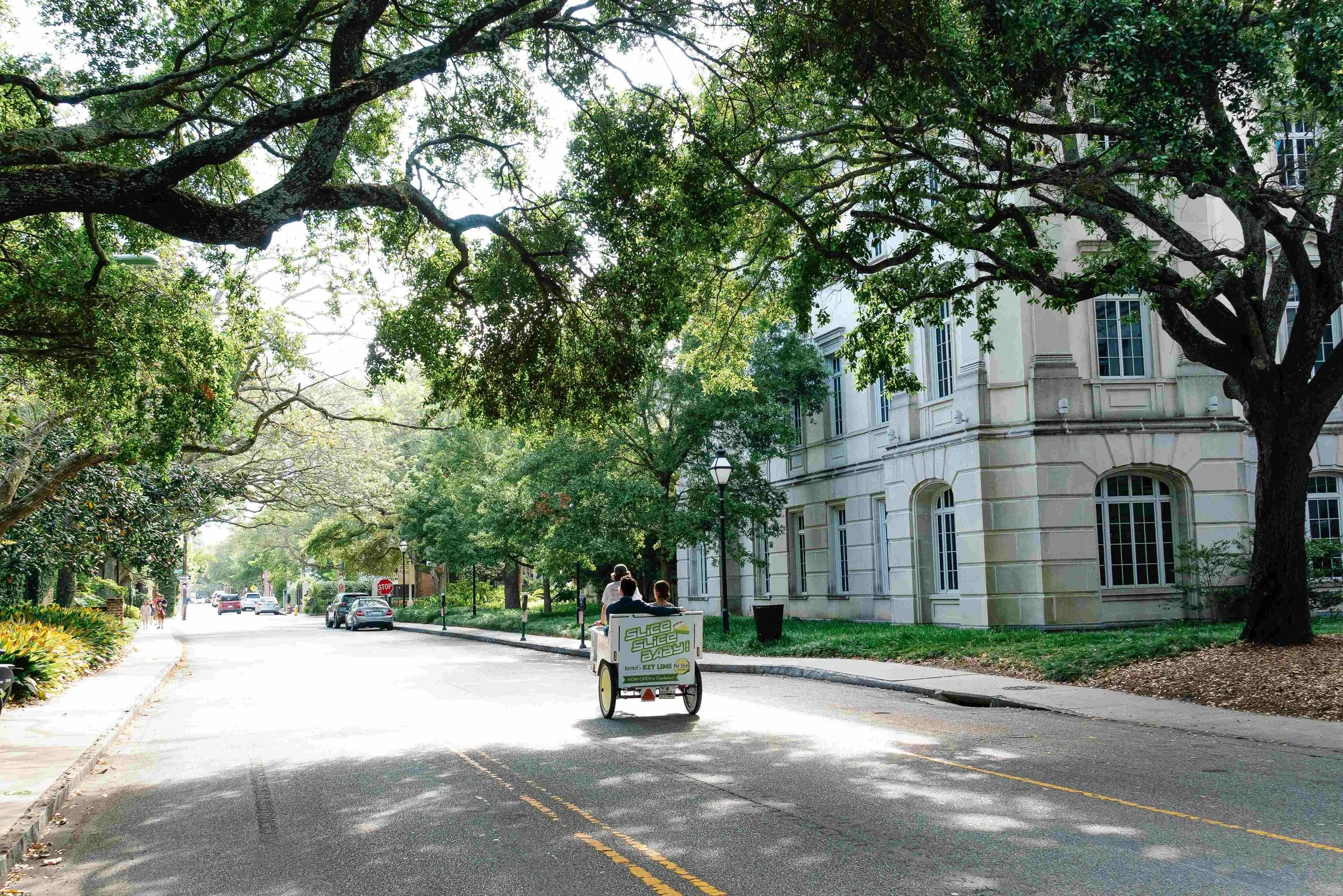 Historic downtown Charleston street with lantern lighting along a Charleston Rickshaw route