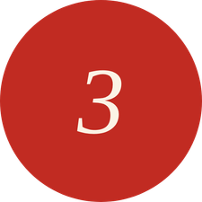 Red circular object with the number 3 in white in the center.