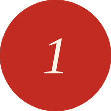 Red circular object with a white number 1 in the center