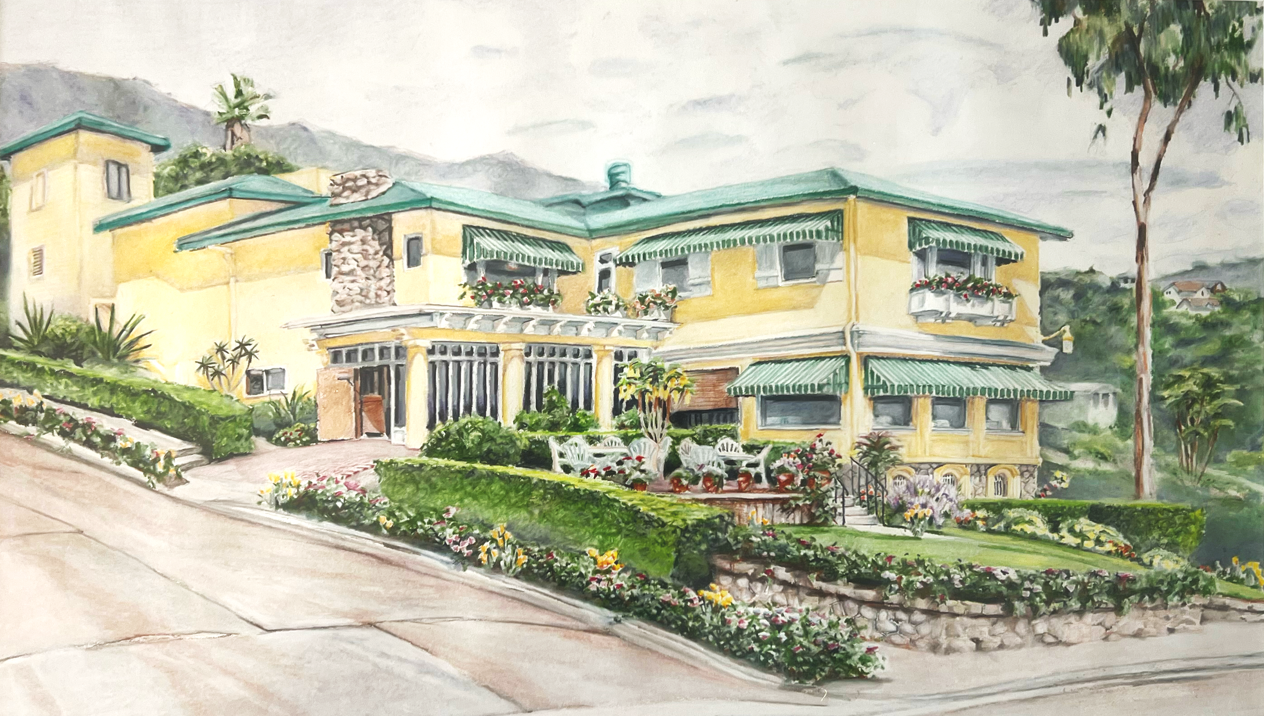 A watercolor painting of a yellow house with green awnings, a landscaped front yard with flowers, and mountains in the background.