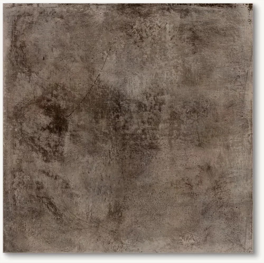 A textured, brown, concrete-like surface with various stains, scratches, and uneven patches.