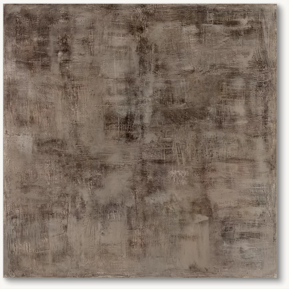 A textured brownish-gray wall with a rough, weathered appearance.