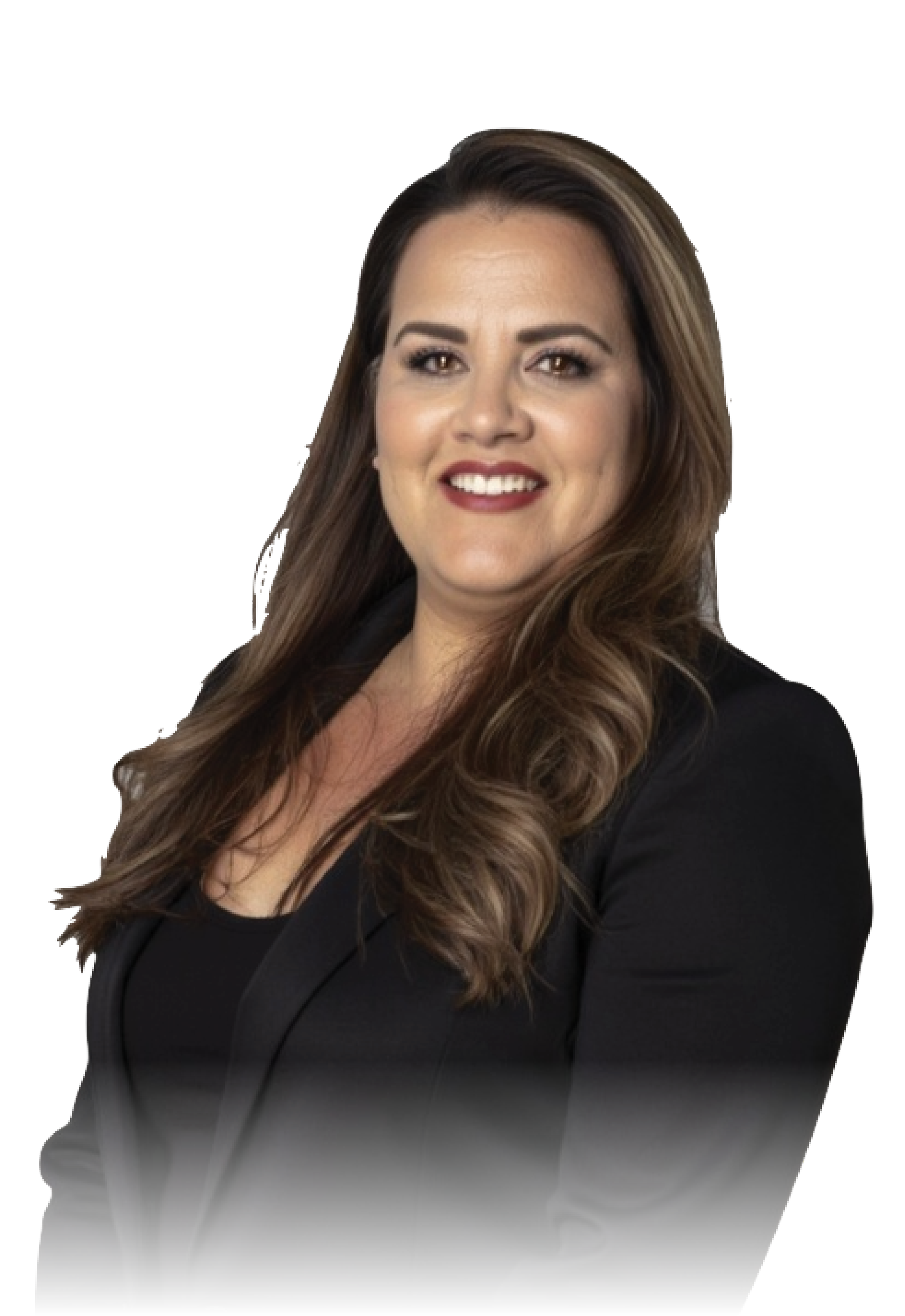 A woman with long, wavy brown hair and brown eyes, dressed in a black blazer and top, smiling confidently.