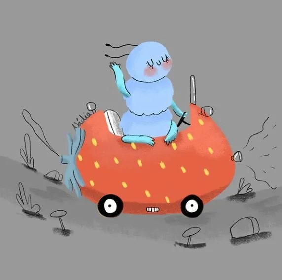 A whimsical drawing of a character with a round blue head and pink cheeks, sitting on a strawberry-shaped vehicle with wheels, on a gray background with plants and rocks.