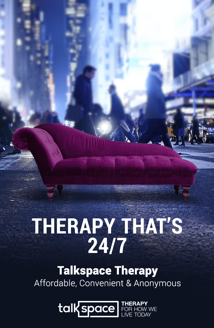 A vibrant pink chaise lounge on a city street with tall buildings and pedestrians in the background, advertising talkspace therapy available 24/7.