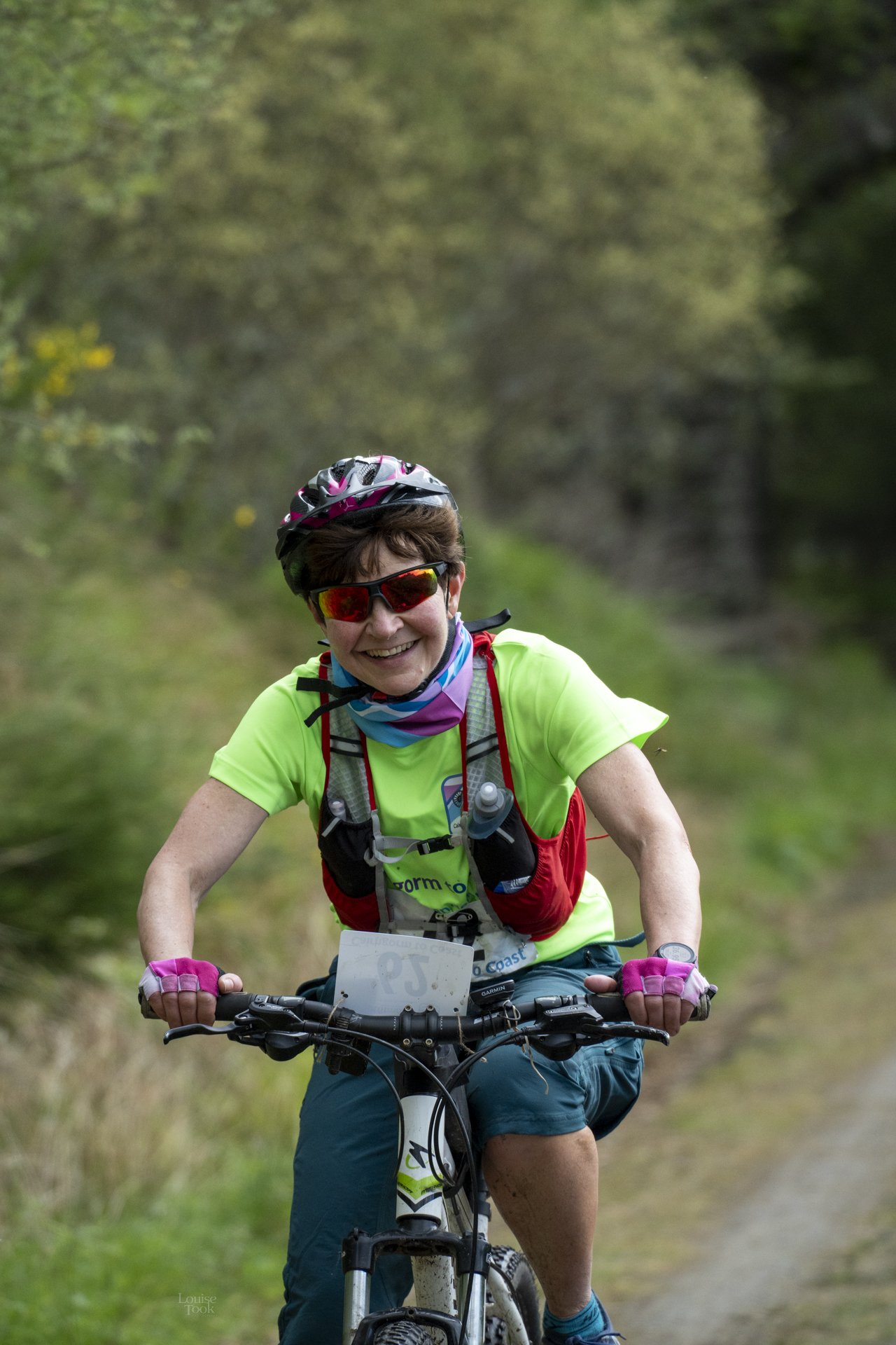 Professional race photography of an entrant in Outfit Moray ultra hike and bike race