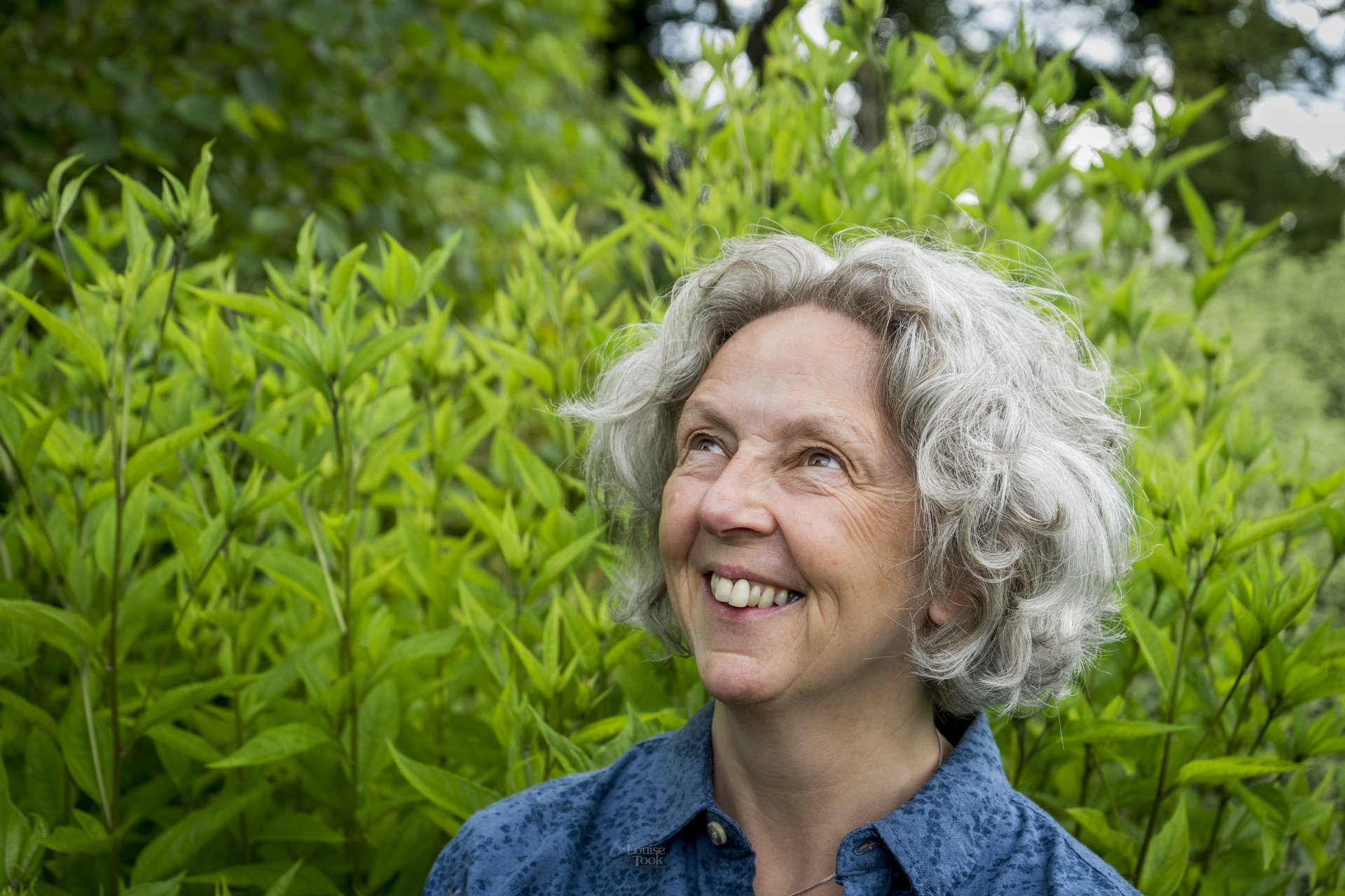 Relaxed and professional business portrait headshot of a gardener in their workplace