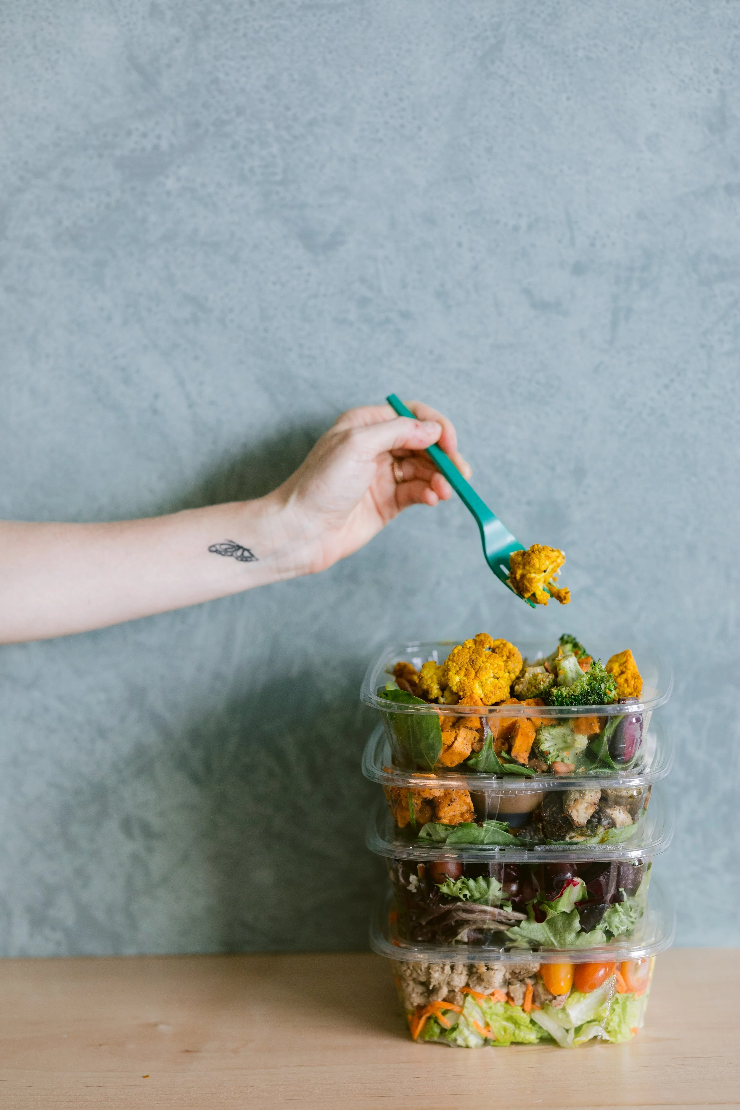 Green Fork & Straw catering — stacked organic gluten-free meal containers