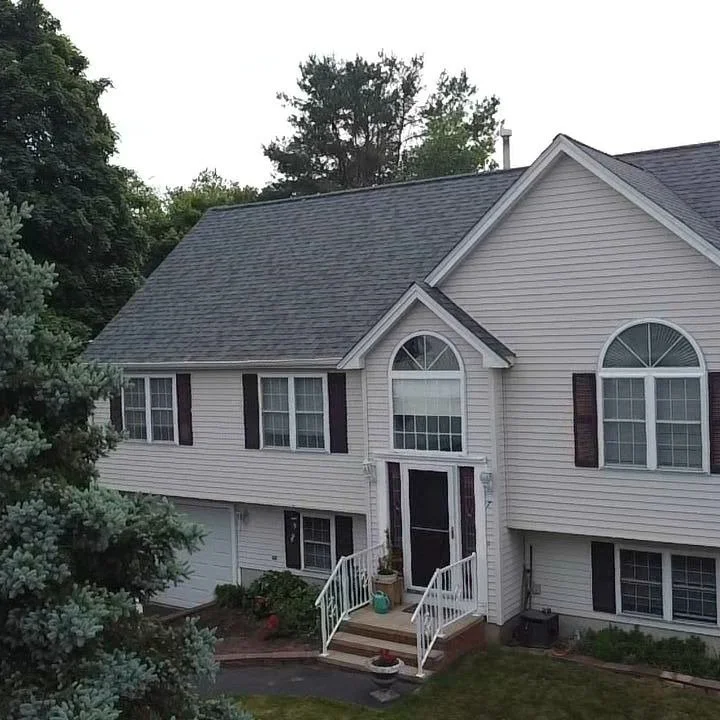 Now that's a good looking roof, and another happy homeowner! Thanks for choosing us to help you with this project Elsa