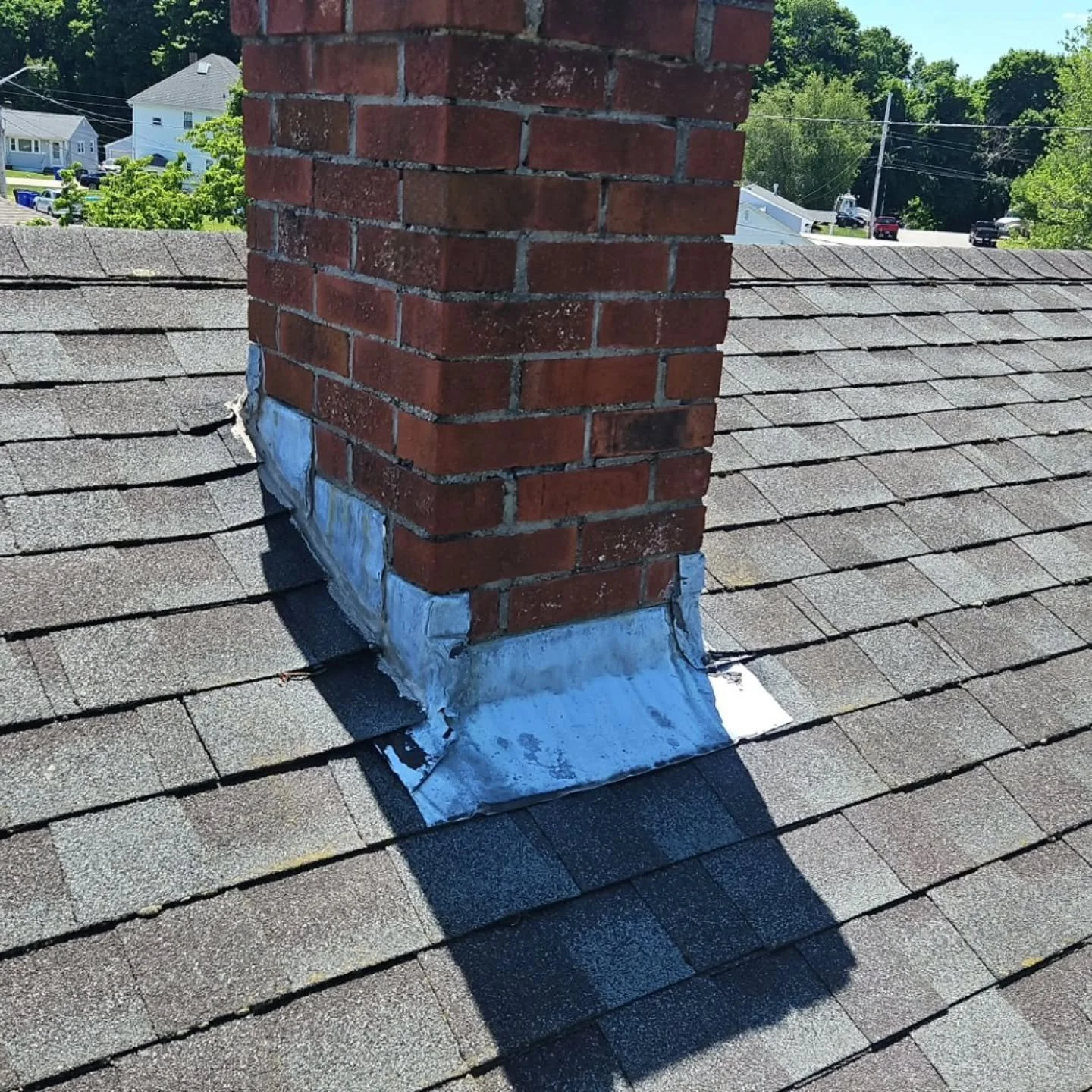 This chimney was looking sad and leaky. But now its bright and protected with our 4 layer protection leak block!