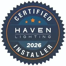 A circular badge with a navy blue background and white text that reads 'Certified Haven Lighting 2026 Installer' with three small gold stars at the top.