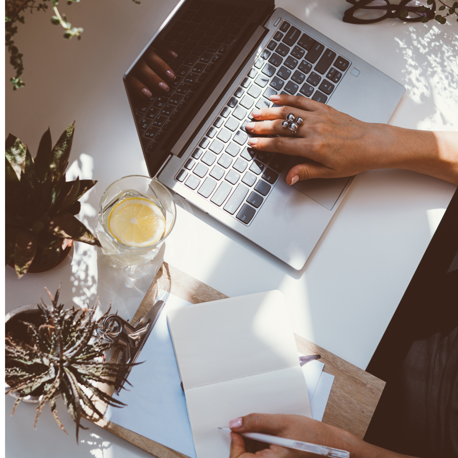 A person typing on a silver laptop keyboard. Virtual therapy for anxious women who have mixed identities, grew up too fast, and wish to feel grounded in themselves throughout New York State.