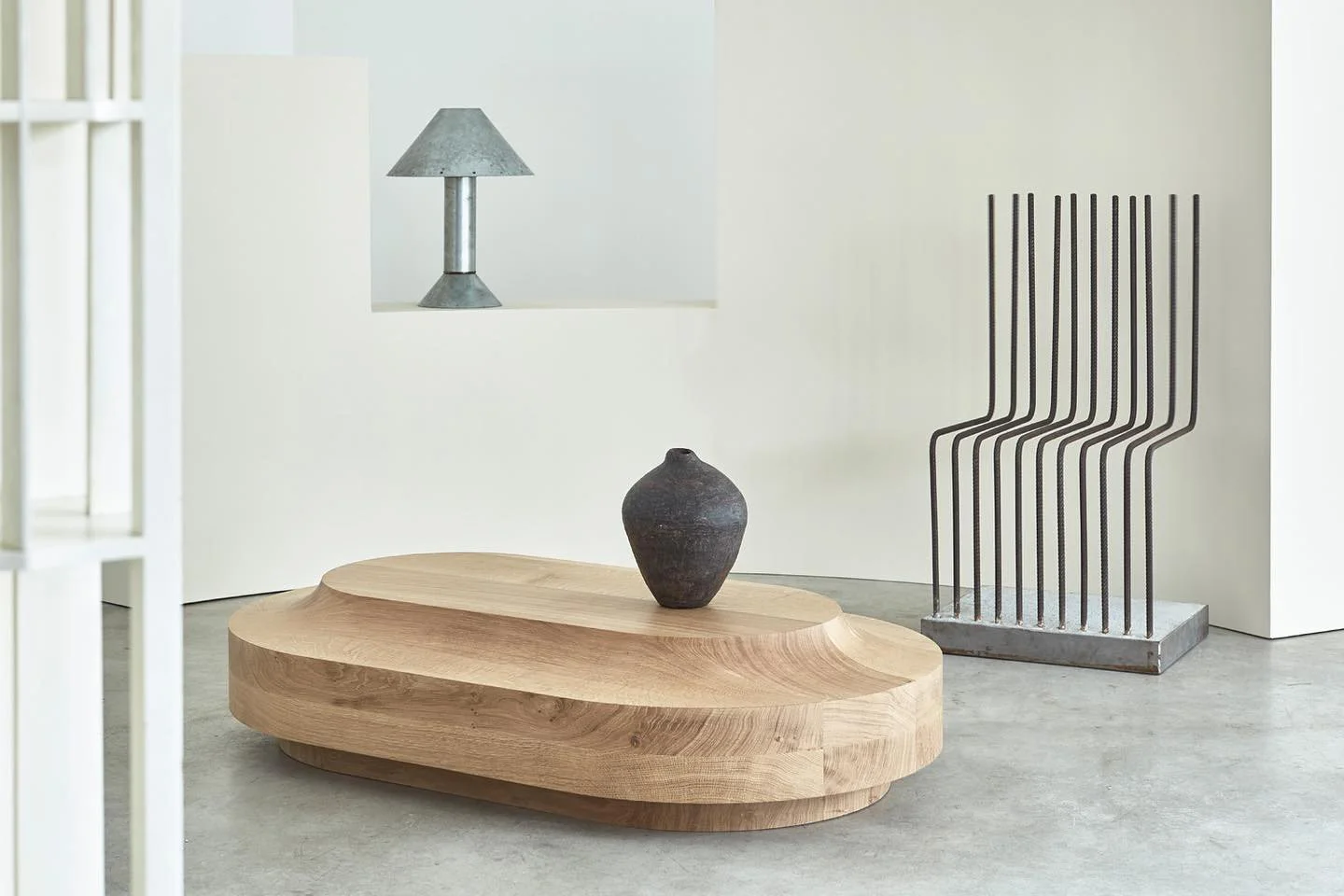 Contemporary furniture and artwork prepared for gallery installation