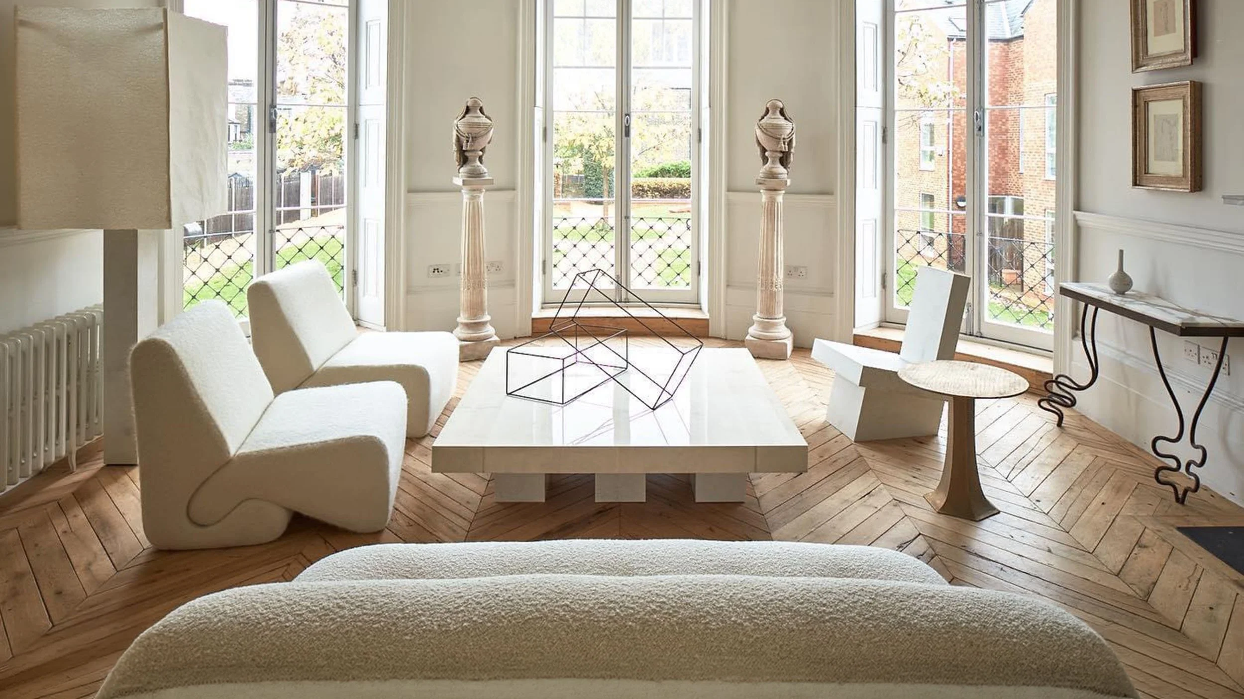 Modern design-led living room completed by Ursa Major following furniture installation and project support.