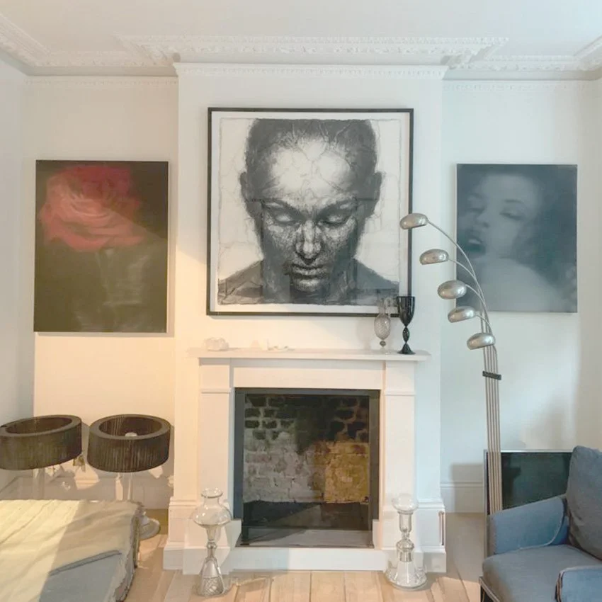 Finished residential living room with artwork and furniture professionally installed.