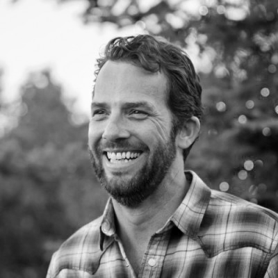 Black and white headshot of Scot Lowry Managing partner at promise one