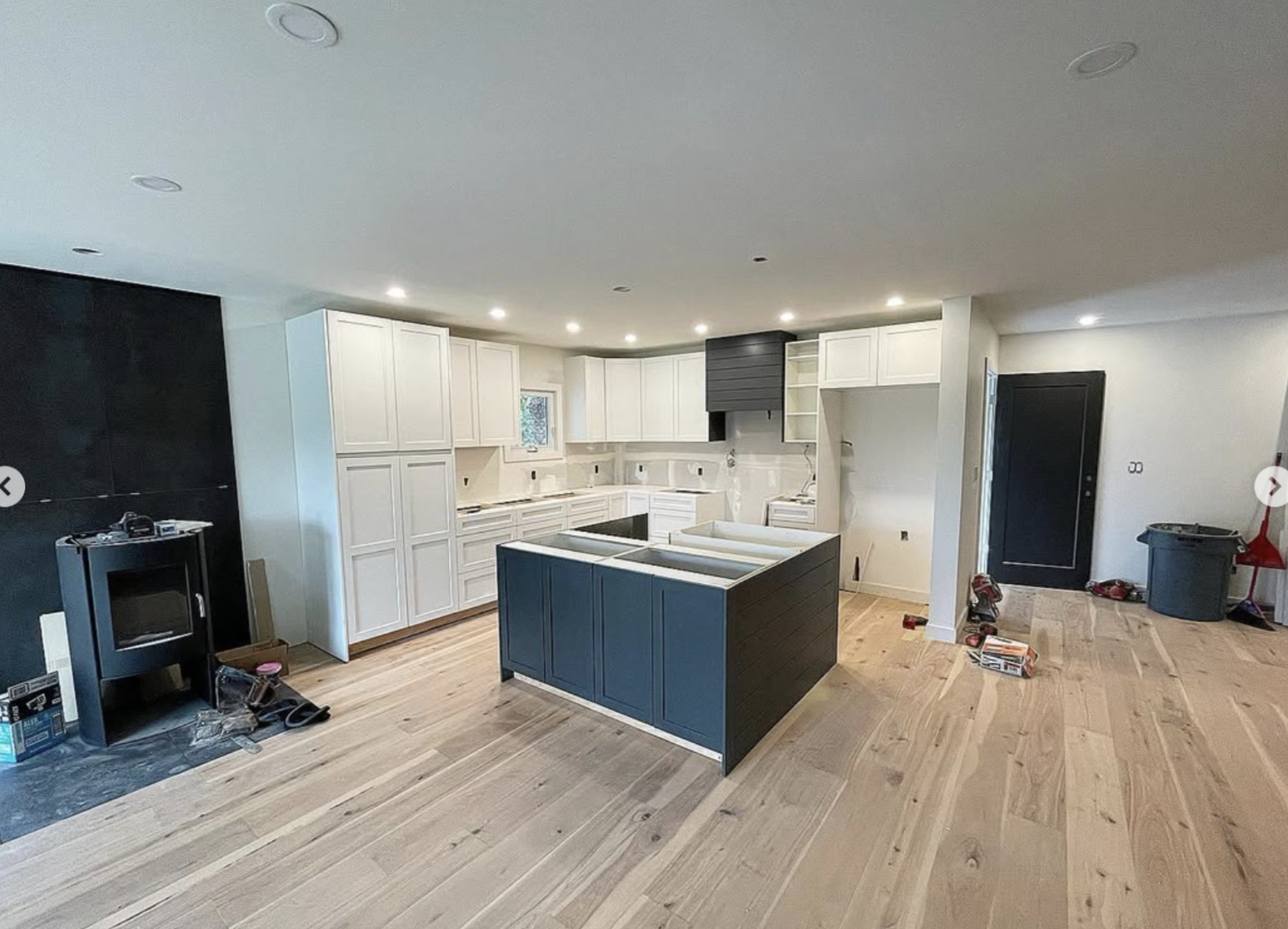 Custom modern kitchen renovation done by a Calgary home builder and renovator. 