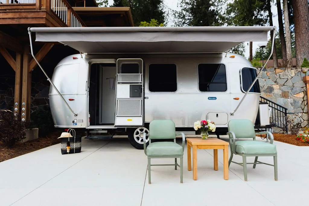The Airstream at The Lab with outdoor seating at The Retreat on Lake Pend Oreille in Sagle, Idaho