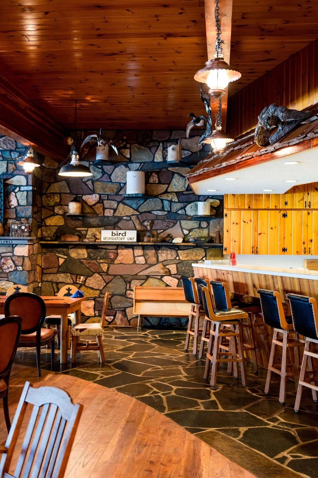 Stone and timber detail in The Hangar at The Retreat on Lake Pend Oreille in Sagle, Idaho