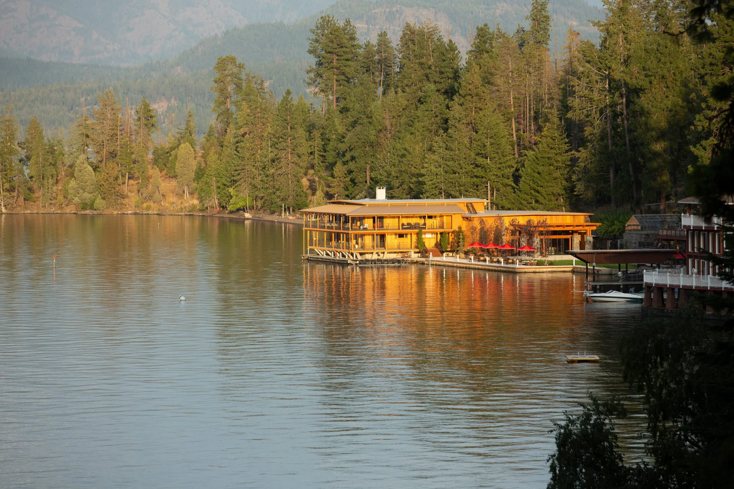 The lodge set against the forest at The Retreat on Lake Pend Oreille in Sagle, Idaho