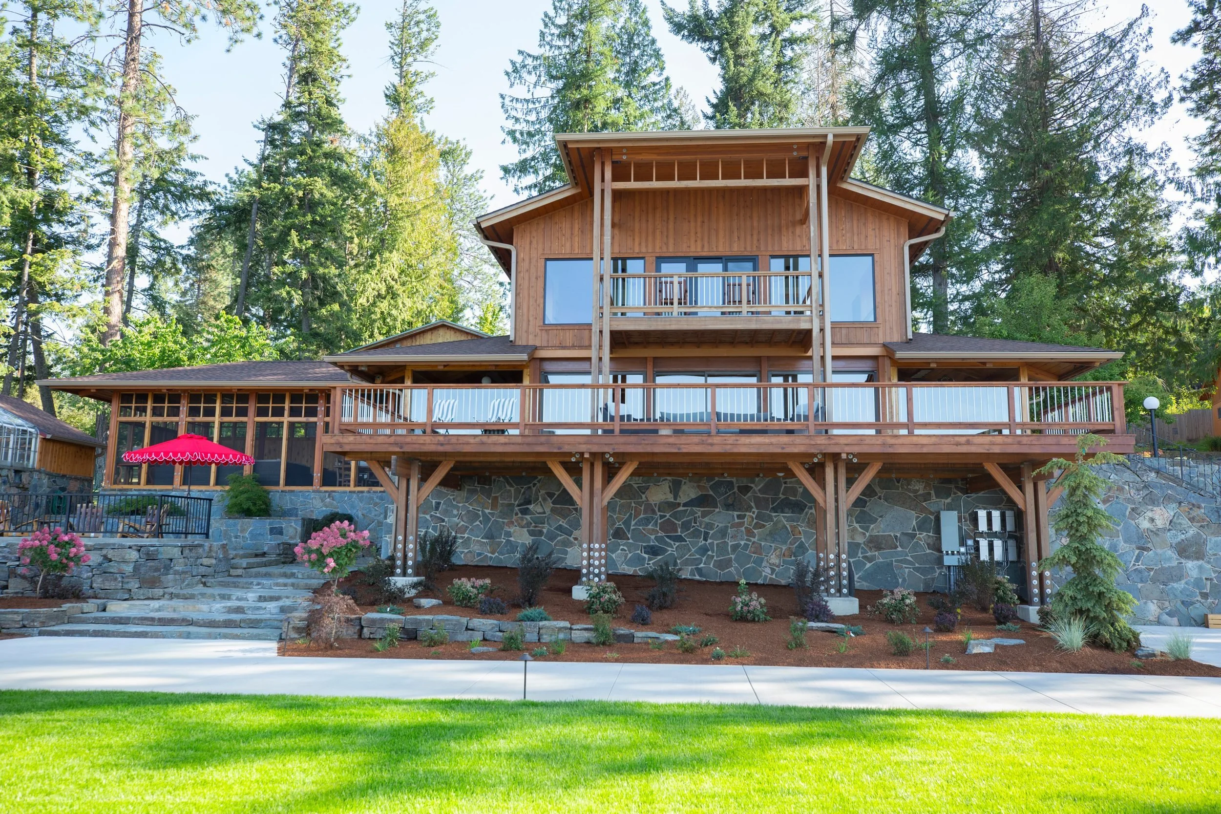 The lodge exterior among the pines at The Retreat on Lake Pend Oreille in Sagle, Idaho