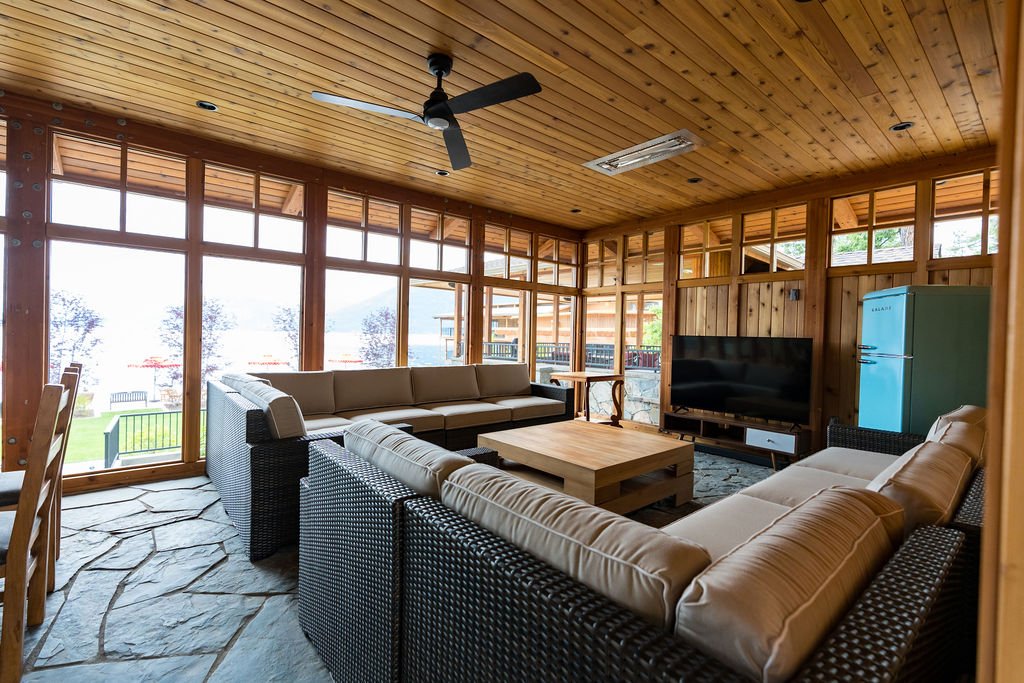 A sunlit lounge with lake views at The Retreat on Lake Pend Oreille in Sagle, Idaho