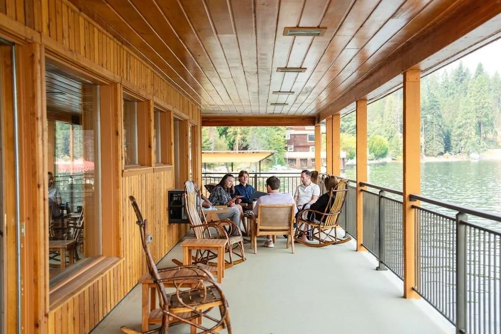 the-retreat-lake-pend-oreille-lakeside-covered-porch-gathering.jpg