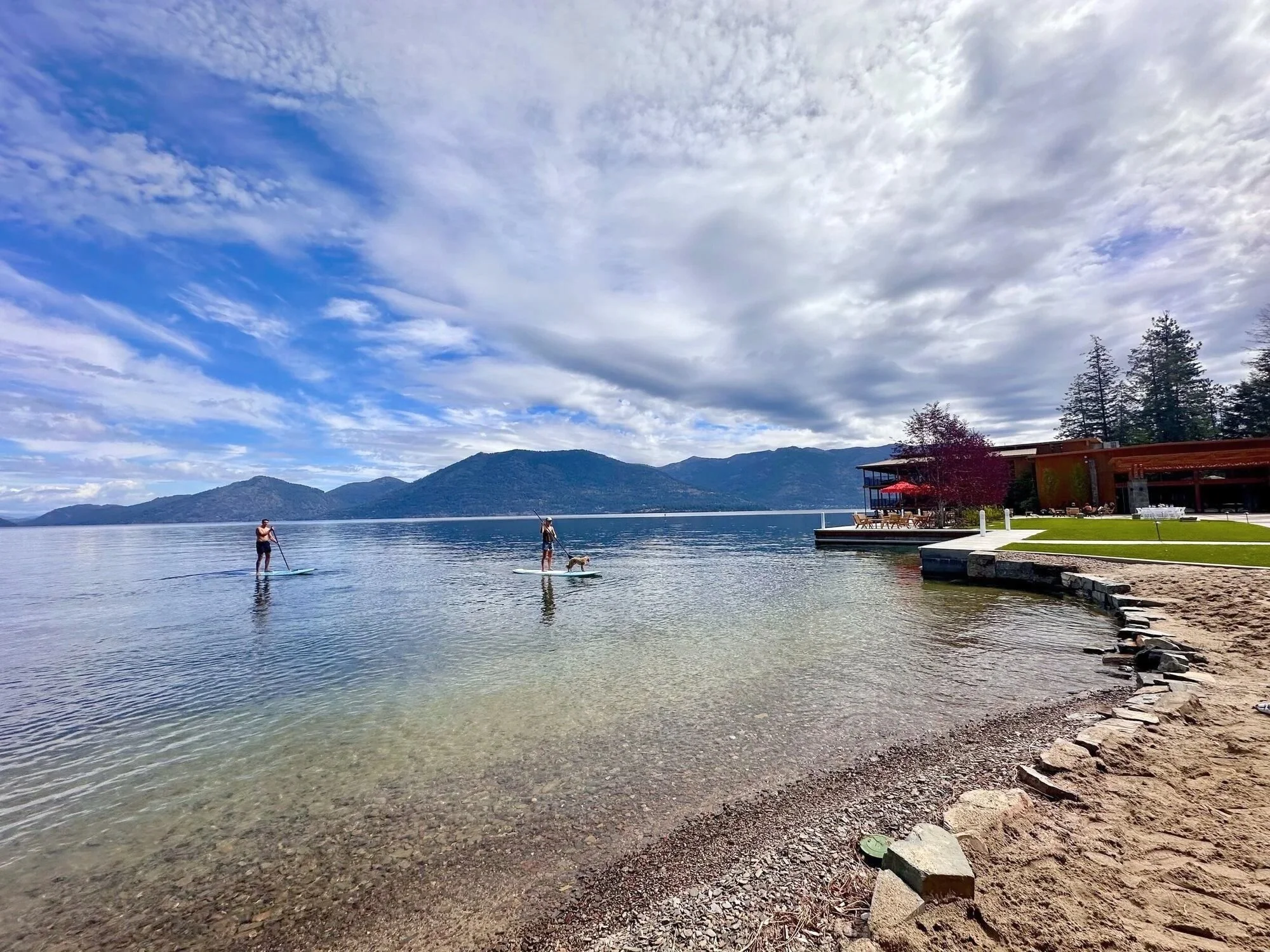 Paddleboarders on the clear water of Lake Pend Oreille in Sagle, Idaho